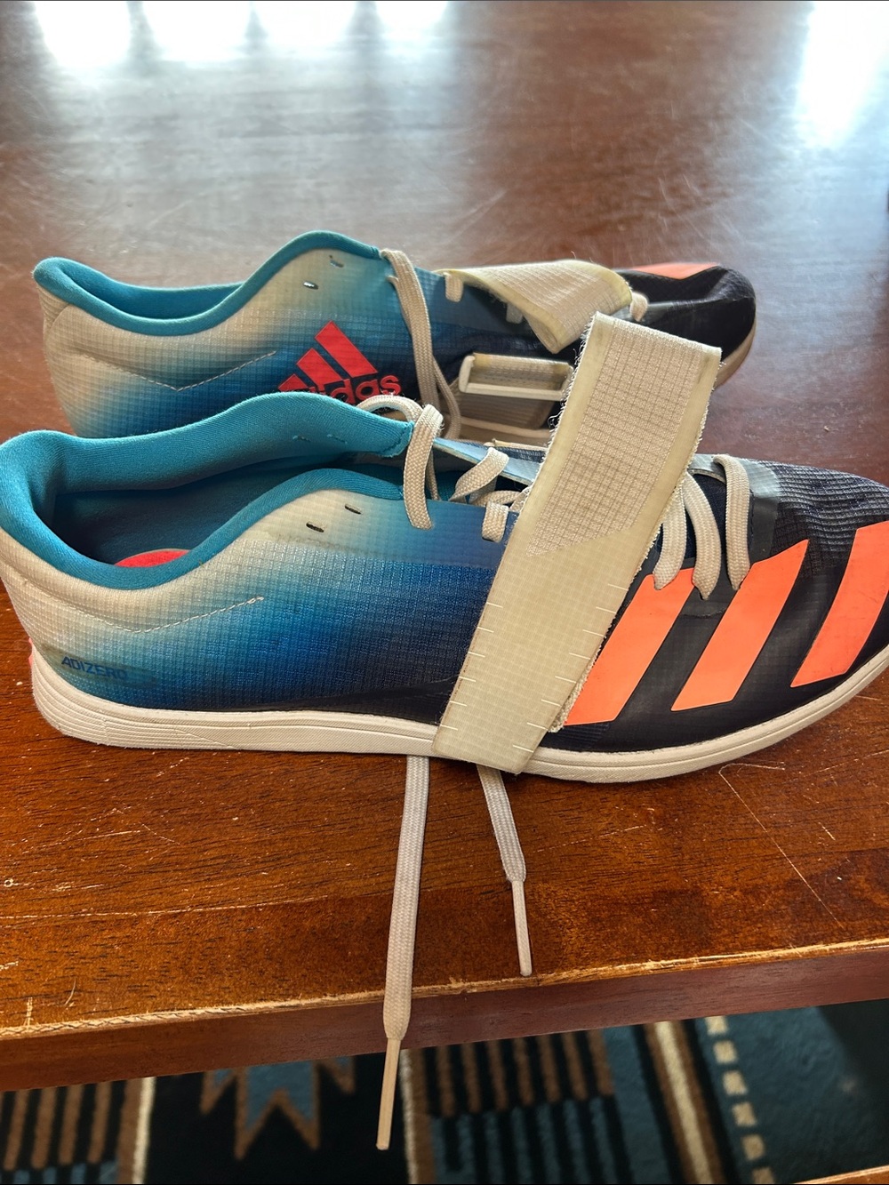 adidas Mens Blue & Coral Strap Lace Pole Vault Cleats- used twice. Great shape